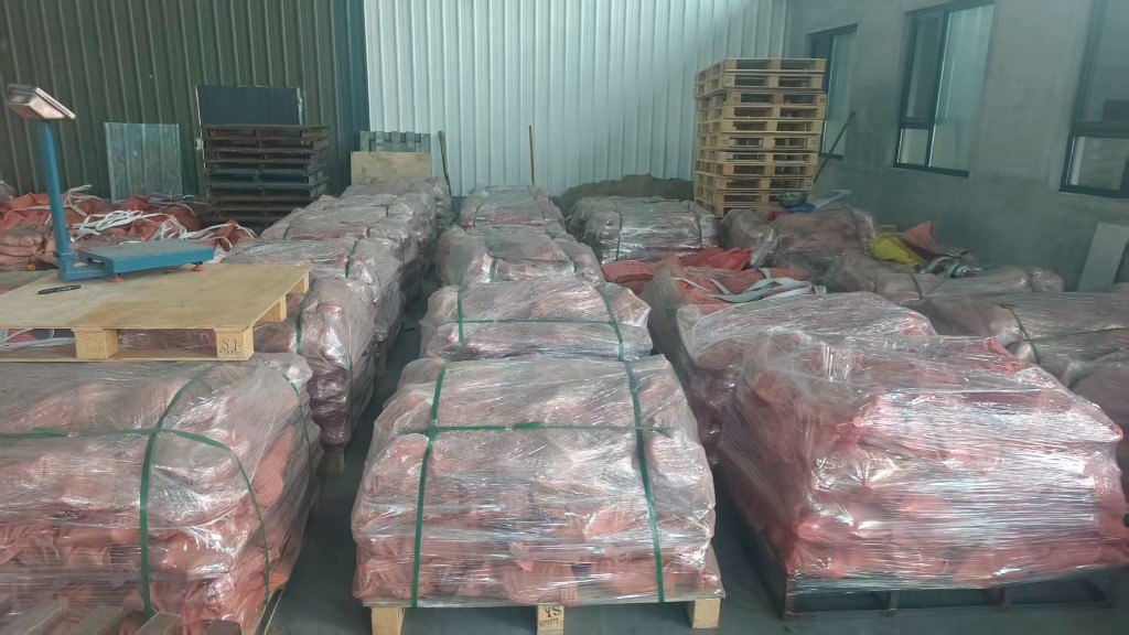 Pallets of rigging hardware ready for export